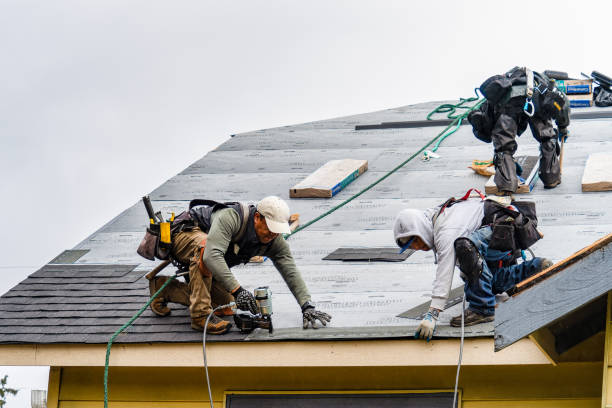 Professional Gutter Installation technician working in Mims, FL